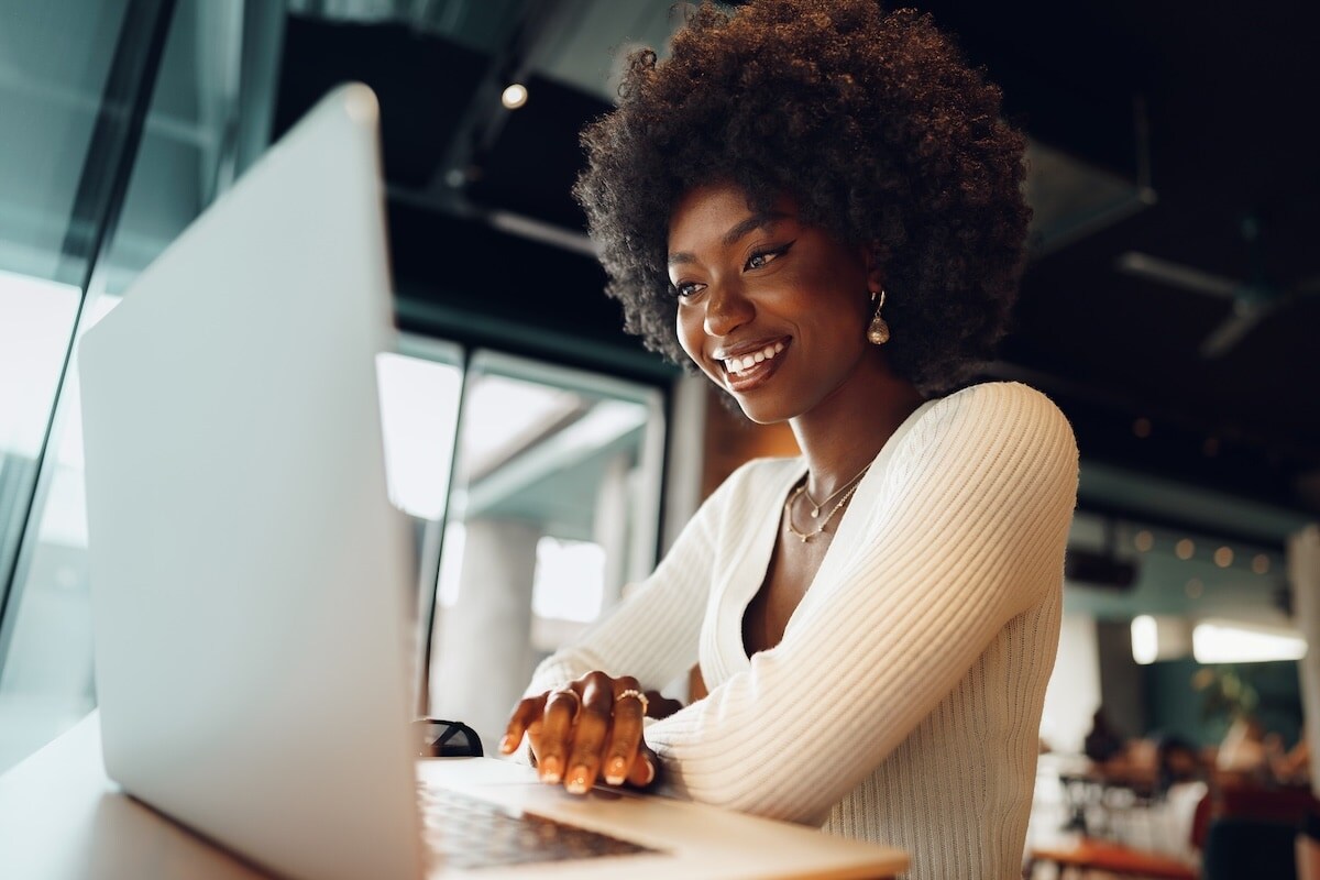 woman looking at laptop