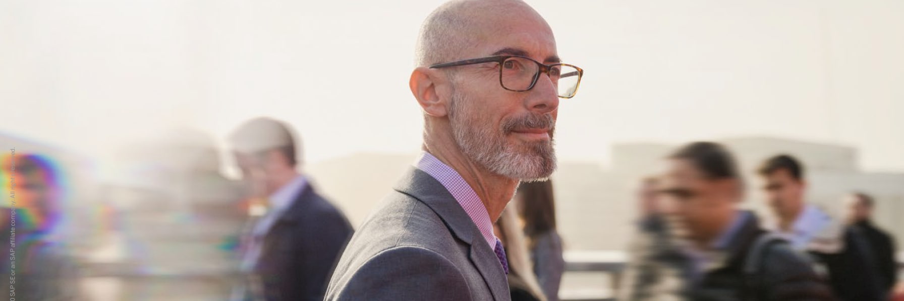 man in suit with glasses