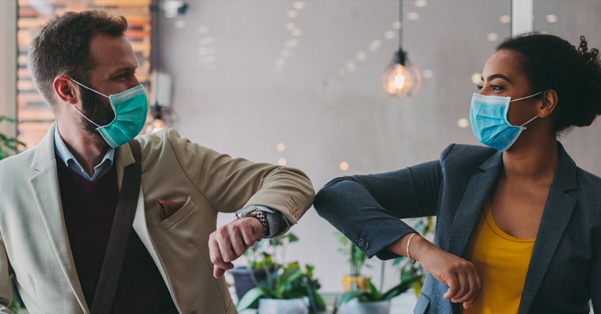 two people wearing mask